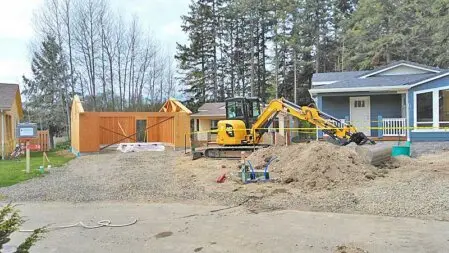 Contractor walking a homeowner through a renovation in progress