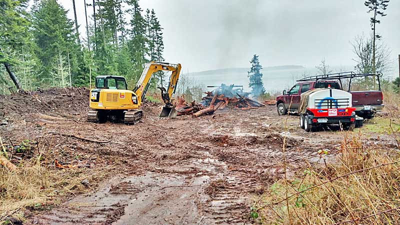 Excavator performing site work on a construction site