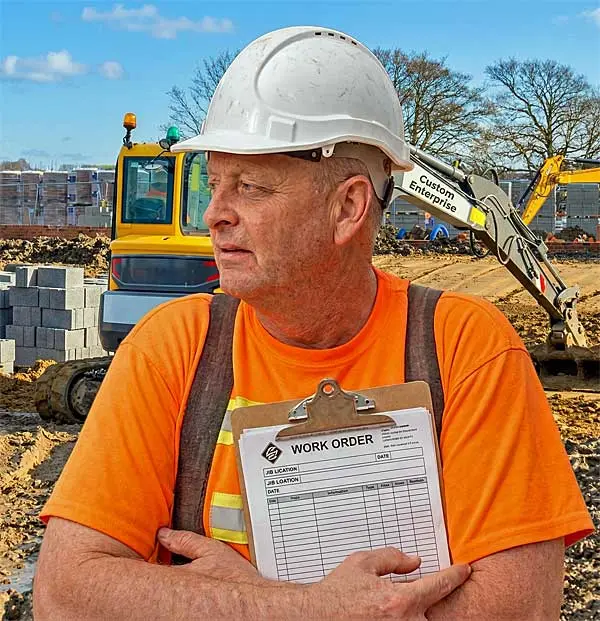 Portrait of a general contractor in work attire on a job site