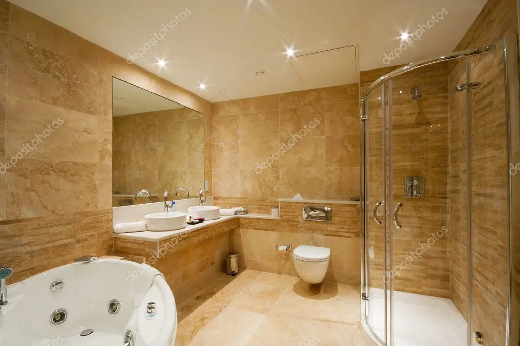 Updated bathroom with new tile and glass shower